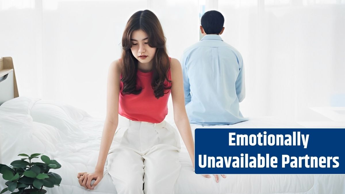 The anxiety of Asian couple lovers on the bed Sad young woman and man sitting on the bed with relationship difficulties feeling sad and thinking in the bedroom at home.